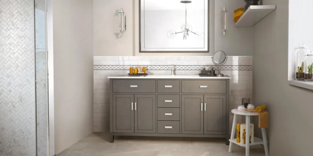 Bathroom remodeling with updated vanity, tile, and shower finishes