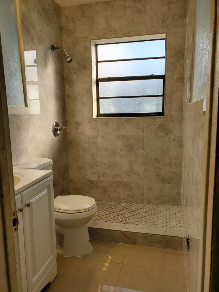 Home remodeling bathroom upgrade with new finishes and improved layout