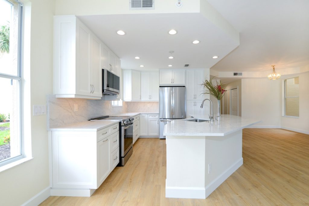 Kitchen renovation with custom cabinetry, coordinated storage, and finish upgrades