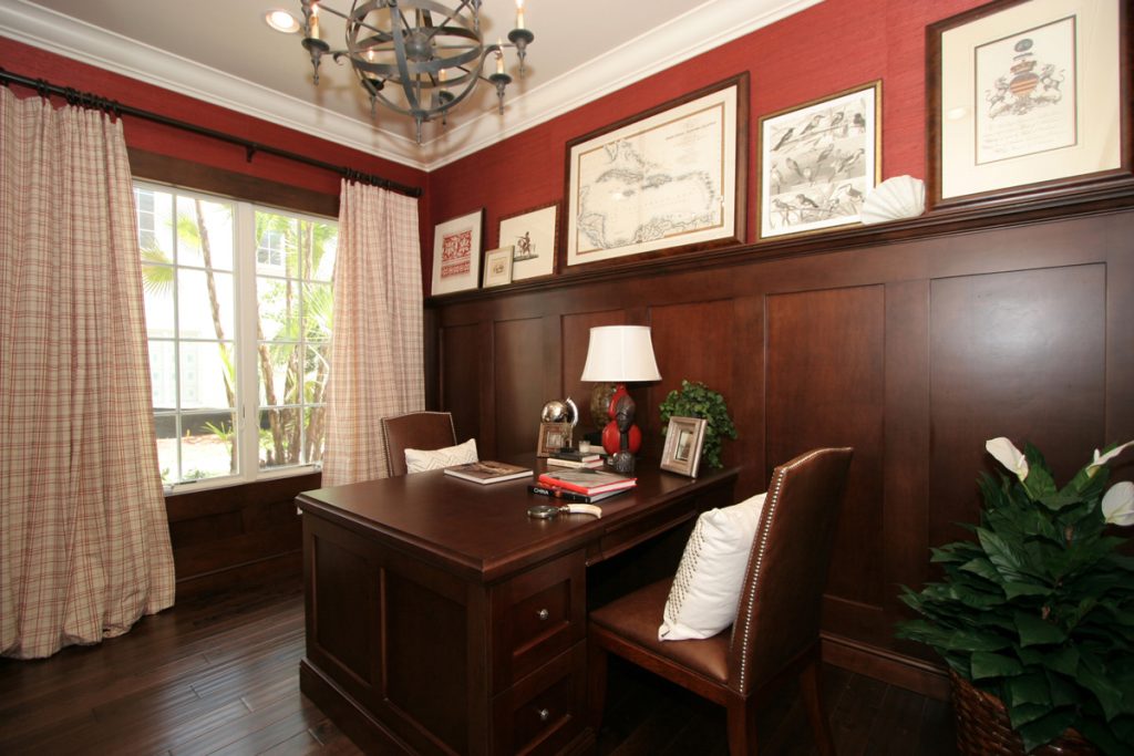 Study renovation with built in cabinets, shelving, and integrated desk workspace